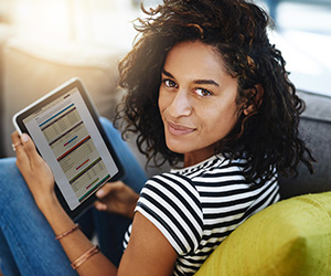 woman sitting with tablet